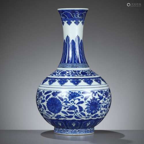 A MING-STYLE BLUE AND WHITE BOTTLE VASE, GUANGXU MARK AND PE...