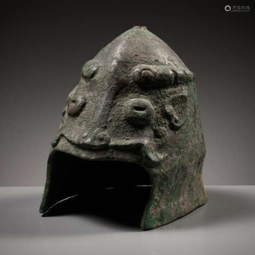 A CEREMONIAL BRONZE HELMET, ZHOU, LATE SHANG DYNASTY