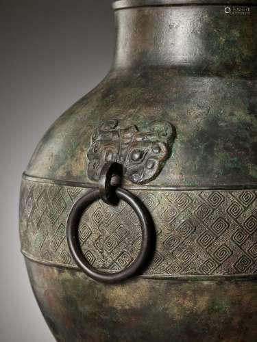 A RARE BRONZE WINE JAR, HU, EASTERN HAN DYNASTY