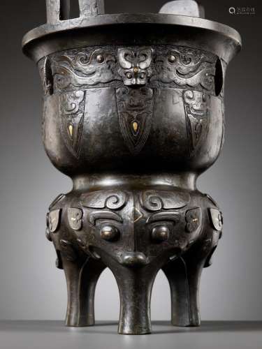 A GOLD AND SILVER-INLAID BRONZE ARCHAISTIC STEAMER, SONG TO ...