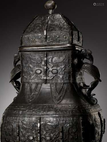 A MASSIVE AND LARGE ARCHAISTIC BRONZE VASE AND COVER, FANGHU...