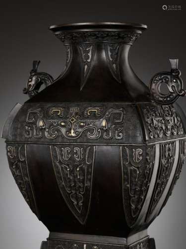 A GOLD AND SILVER-INLAID BRONZE HU-FORM ARCHAISTIC VASE, 18T...