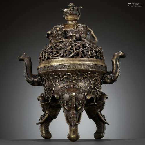 AN INLAID BRONZE ‘ELEPHANT’ TRIPOD CENSER AND OPENWORK COVER...