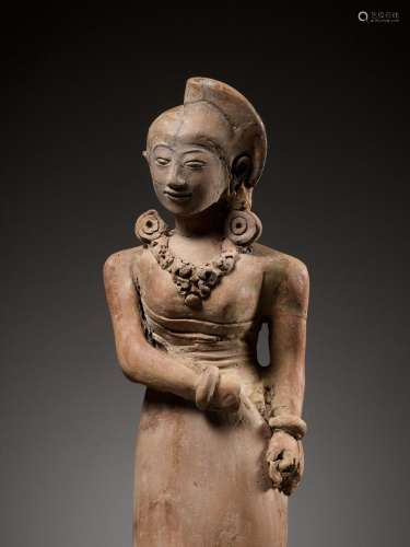 A MAGNIFICENT AND VERY LARGE TERRACOTTA FIGURE OF A STANDING...