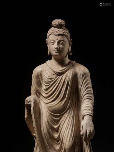 A RARE AND IMPORTANT STUCCO FIGURE OF BUDDHA, ANCIENT REGION...