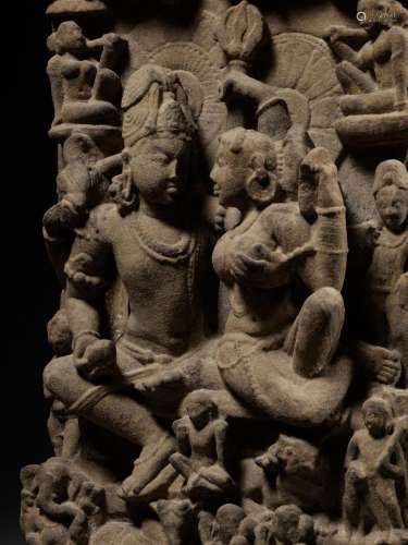 A SANDSTONE STELE OF UMA MAHESHVARA, CENTRAL INDIA, 11TH-12T...