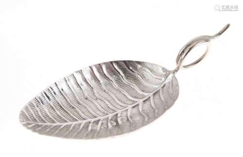 George III silver caddy spoon of leaf design