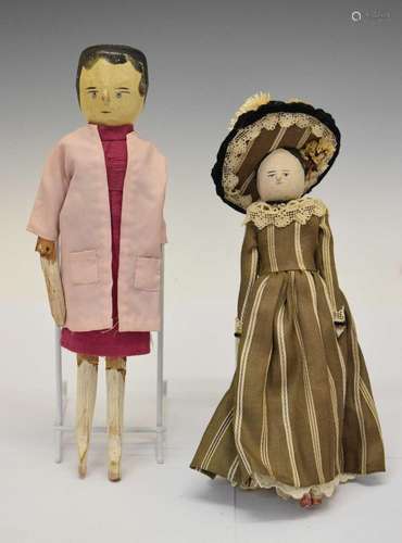 Two wooden peg dolls