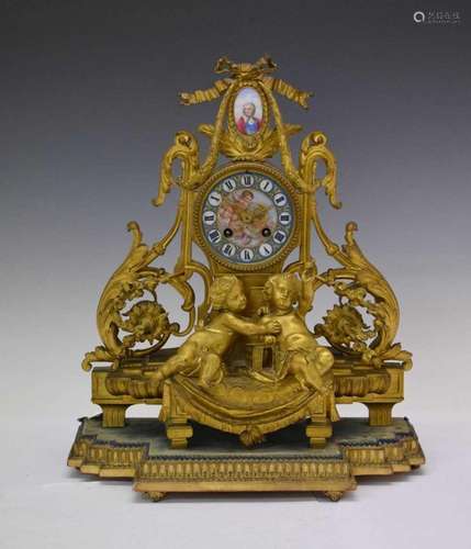 Mid 19th Century French gilt bronze and porcelain mantel clo...