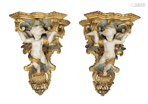 Pair of rococo cherub wall brackets