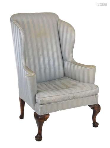 Wing armchair, upholstered in striped blue silk