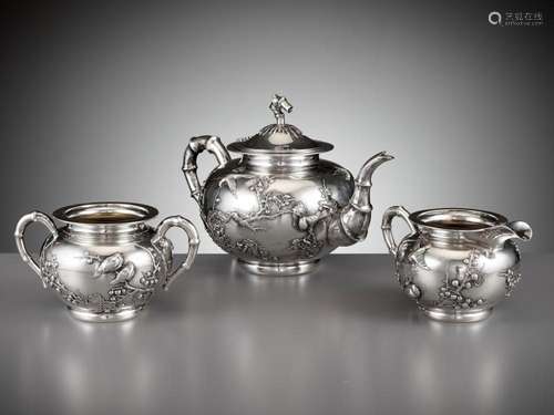 A THREE-PIECE ‘MAGPIES’ SILVER TEA SERVICE, MARK OF LUEN WO,...