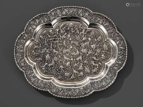 A LARGE SILVER REPOUSSÉ ‘BUDDHIST LION’ TRAY, LATE QING DYNA...