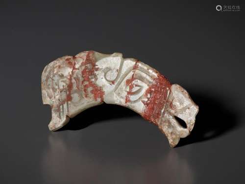 A PALE CELADON JADE ‘CRESTED MYTHICAL BIRD’ FRAGMENT, SHANG ...