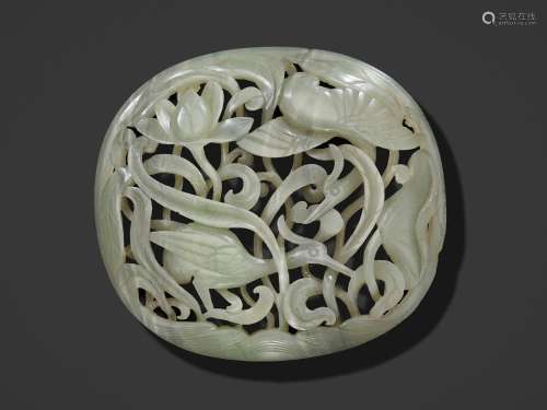 A CELADON JADE ‘CRANE AND LOTUS’ PLAQUE, YUAN TO MING DYNAST...