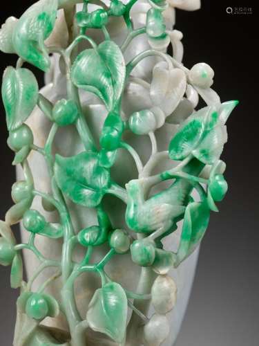 A LAVENDER AND EMERALD-GREEN JADEITE ‘BIRDS AND FLOWERS’ VAS...