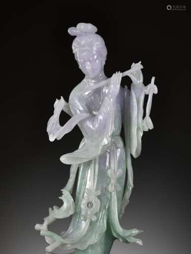 A LAVENDER AND APPLE-GREEN JADEITE FIGURE OF A BEAUTY PLAYIN...