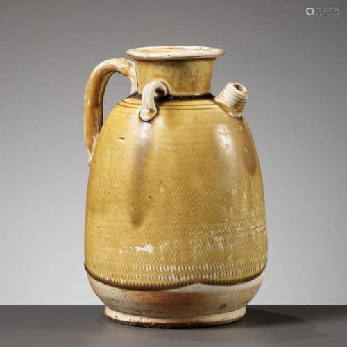 AN AMBER GLAZED ‘HATCHED’ EWER, TANG DYNASTY