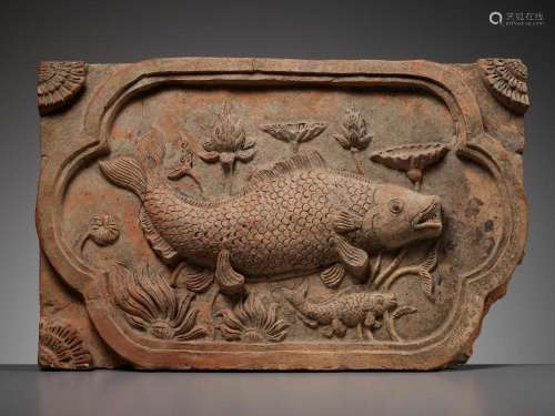 A RED POTTERY ‘DOUBLE FISH’ TILE, SECOND HALF OF THE MING DY...