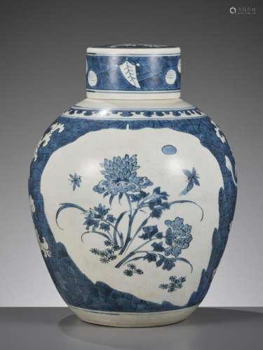 A BLUE AND WHITE GINGER JAR AND COVER, TRANSITIONAL PERIOD, ...