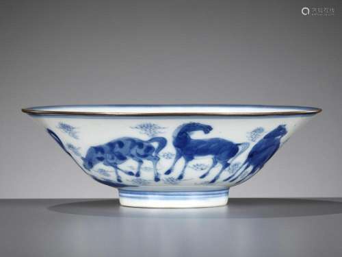 A BLUE AND WHITE ‘EIGHT HORSES OF MU WANG’ BOWL, KANGXI PERI...