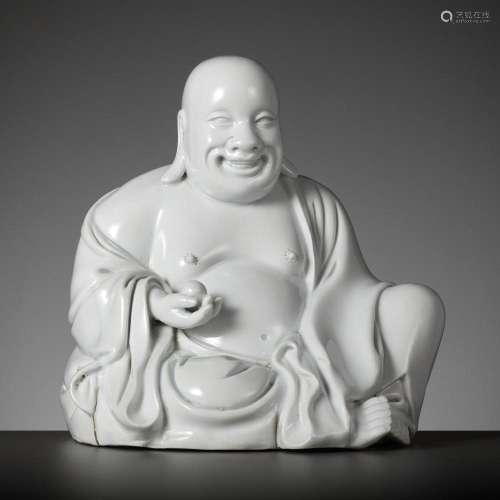 A RARE WHITE GLAZED FIGURE OF A SEATED BUDAI, DEHUA, SIGNED ...