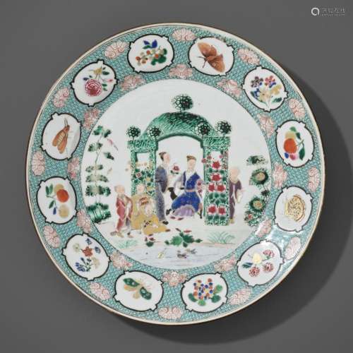 A FAMILLE ROSE ‘IN THE ARBOR’ DISH BY CORNELIUS PRONK, CHINA...