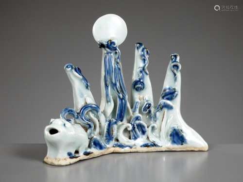 A BLUE AND WHITE ‘MOUNTAIN’ BRUSHREST WITH AN INTEGRAL ‘XINI...