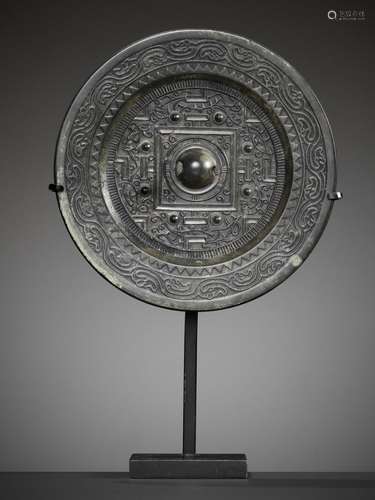 A SILVERY BRONZE 'TLV' MIRROR, HAN DYNASTY