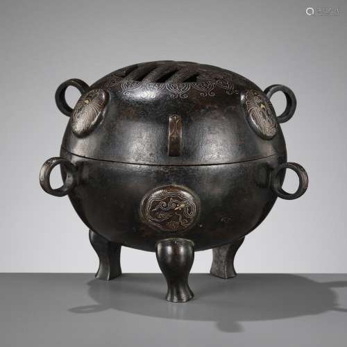 AN ARCHAISTIC GOLD AND SILVER-INLAID BRONZE TRIPOD CENSER, D...