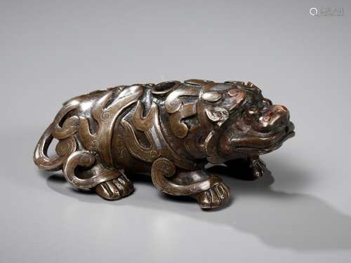 A SILVER-INLAID BRONZE ‘BUDDHIST LION’ WATERDROPPER, 17TH-18...