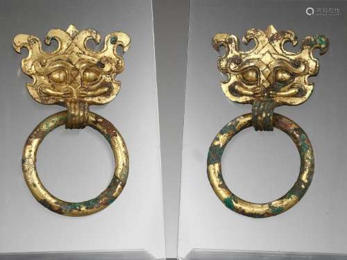 A PAIR OF GILT-BRONZE TAOTIE MASK FITTINGS WITH LOOSE RING H...