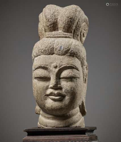 A RARE SANDSTONE HEAD OF GUANYIN, SUI TO TANG DYNASTY