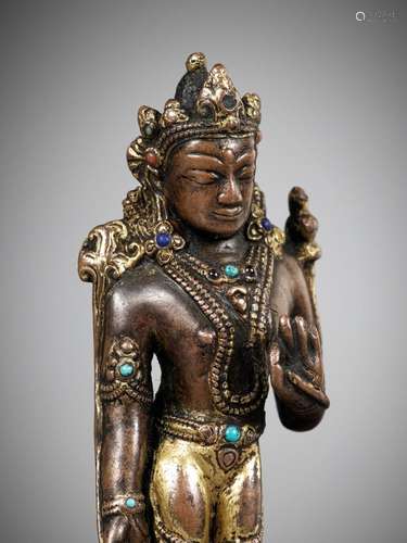 A RARE GILT COPPER ALLOY FIGURE OF A STANDING MAITREYA, NEPA...