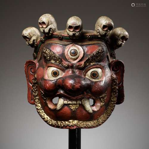 A POLYCHROME AND GILT-LACQUERED PAPIER-MÂCHÉ RITUAL MASK FOR...