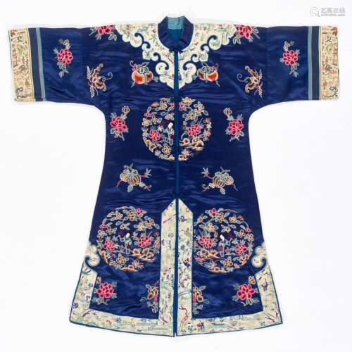 A FINELY EMBROIDERED NAVY BLUE SILK WOMAN'S INFORMAL JAC...