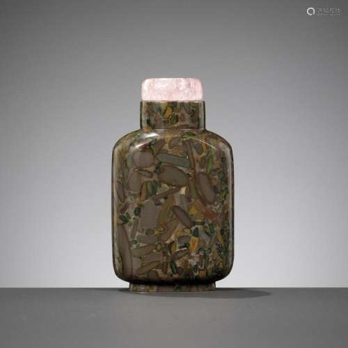 A PUDDINGSTONE SNUFF BOTTLE, QING DYNASTY