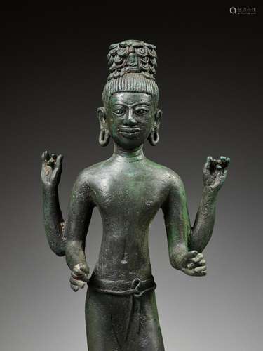 A BRONZE FIGURE OF AVALOKITESHVARA, ANGKOR PERIOD, BANTEAY S...