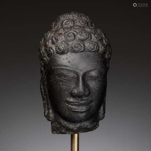 A BLACK STONE HEAD OF BUDDHA, MON-DVARAVATI PERIOD