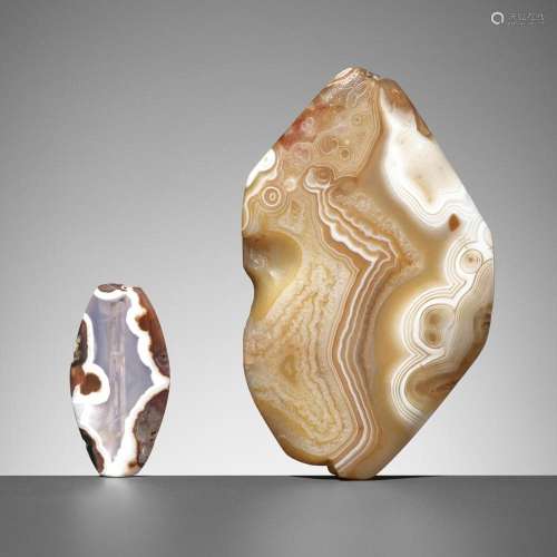 TWO BACTRIAN BANDED AGATE BEADS, LATE 3RD TO EARLY 2ND MILLE...