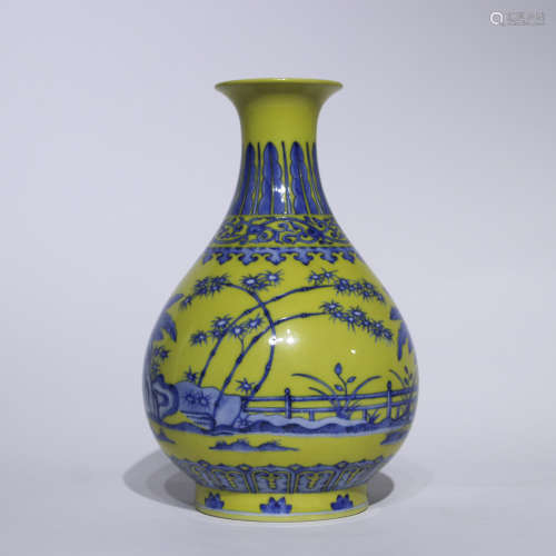 A yellow glazed blue and white pear-shaped vase