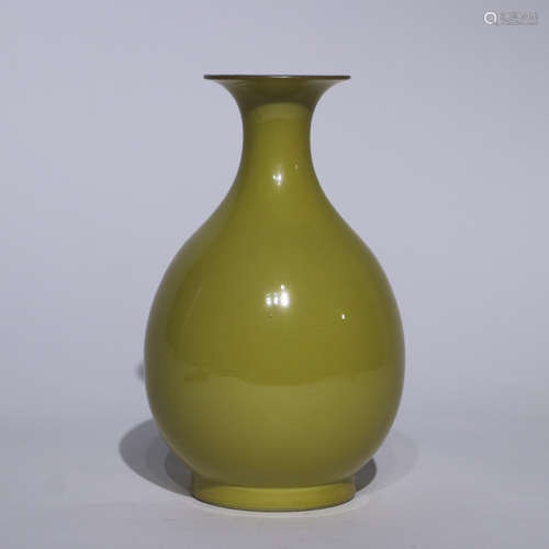 A yellow glazed pear-shaped vase