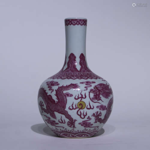 A carminum glazed 'dragon' globular vase
