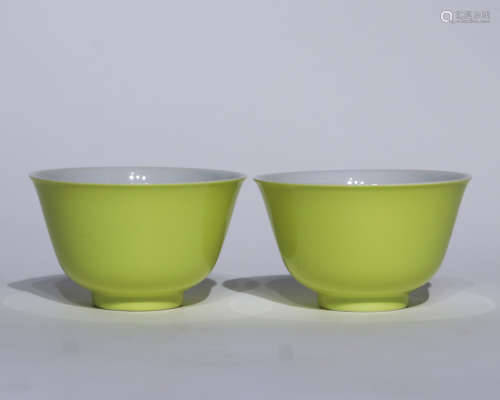 A pair of yellow glazed bowl