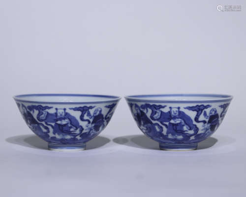 A pair of blue and white 'figure' bowl