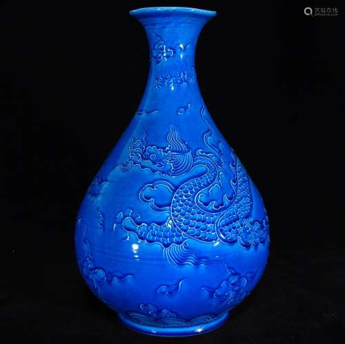 Dark blue glaze carved dragon okho spring bottle, 32 x 20