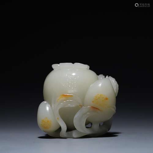 And hetian jade live sanduo 5.6 cm long and 5.8 cm wide thic...