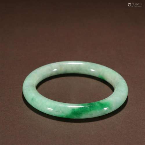 A Top and Rare Carved Jadeite Bracelet