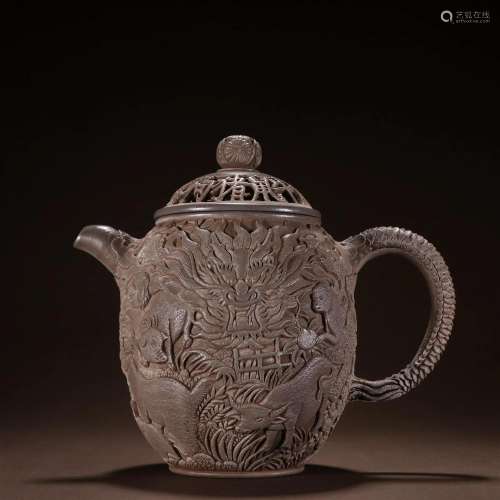 A Rare Zisha 'Zodiac' Pattern Teapot