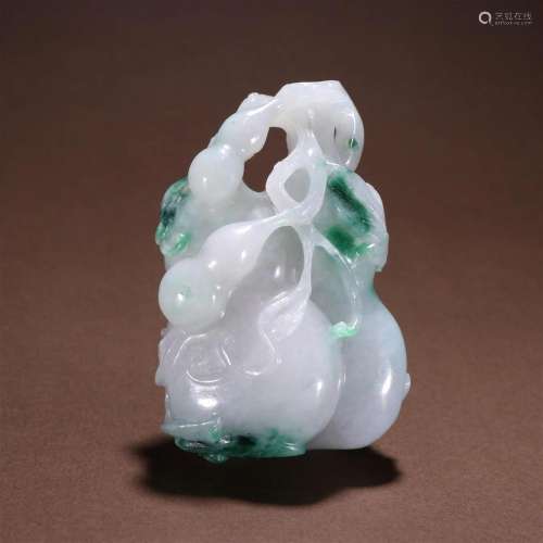 A Fine and Top Carved Jadeite Pendant